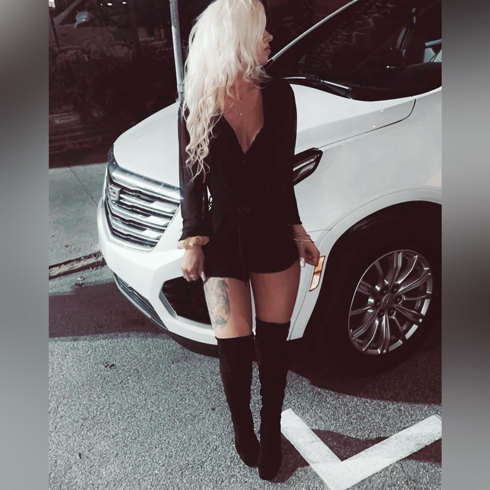 Black Shorts Romper with plunging, belly button low cut line for ‘front styled”